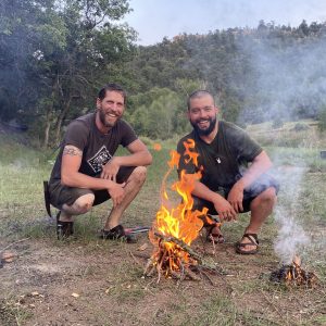 Friendly survival class instructors demonstrate firecraft