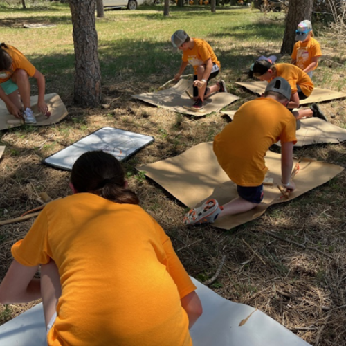 Teaching young adventures to use bow drill is fun and helps them understand fire at a whole new level.