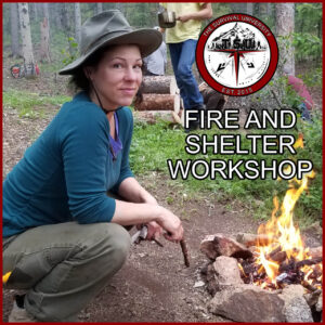 A woman kneels beside a small campfire in a Colorado forest, smiling while holding a ferro rod. Behind her, others prepare camp in the woods. The Survival University logo appears in the top corner with the text “Fire and Shelter Workshop.”