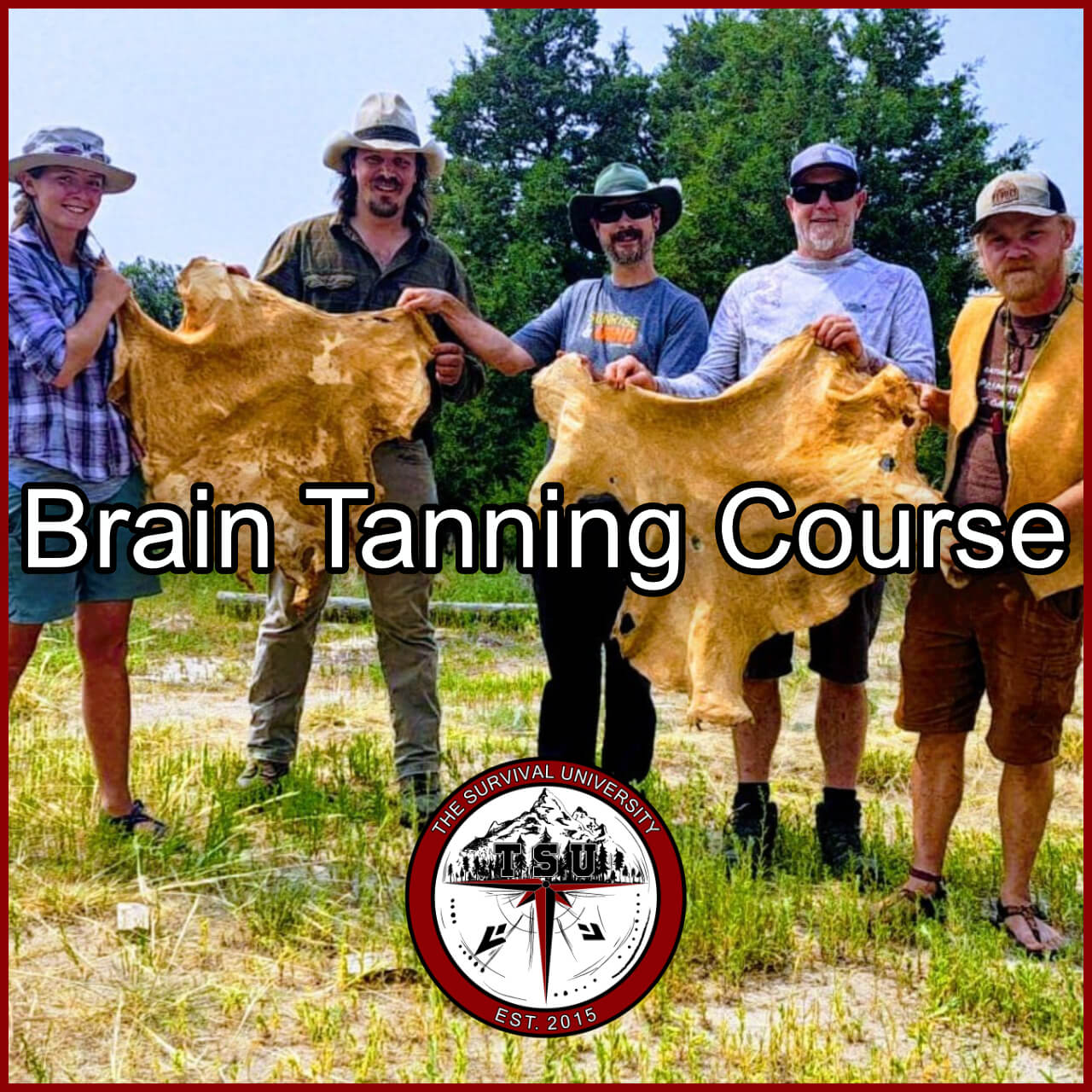 Students at The Survival University holding finished buckskin hides during the Brain Tanning Course in Colorado.